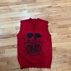 Red Sleeveless Sweater with Skull Design